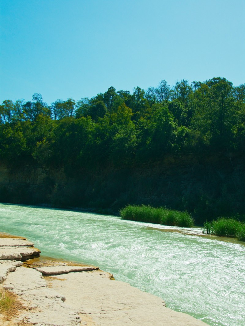 Clear river over limestone ledges
