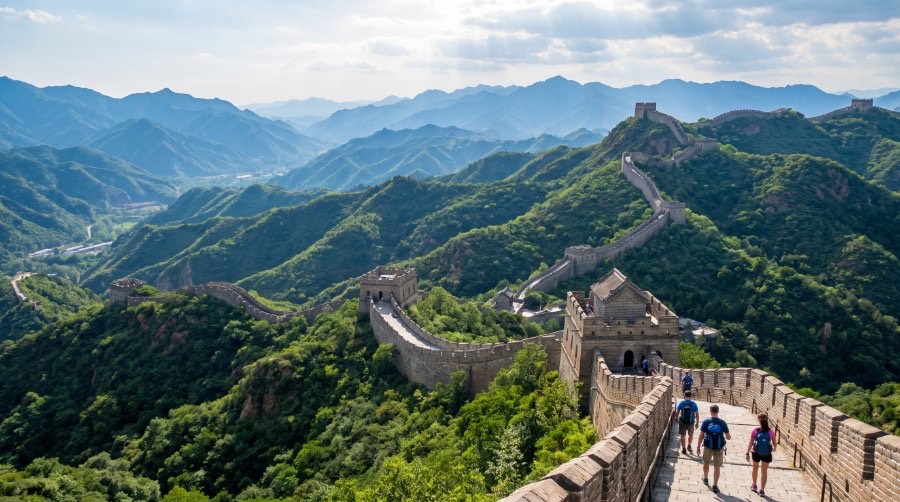 Great Wall winding over green mountains